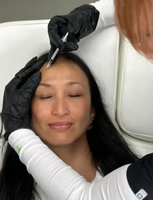 Mindy Jackson giving injections to client