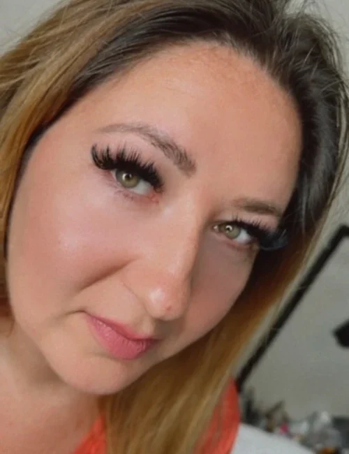 Close up of a woman's face with new lash extensions