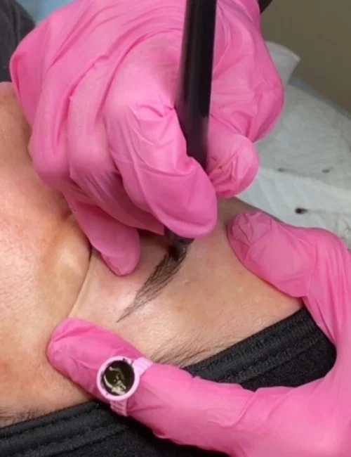 Client getting microblading done at EDEN Day Spa